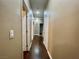 Hallway with hardwood floors leading to other rooms in the house at 8203 Heather Rock Ct, Las Vegas, NV 89117