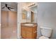 Bathroom featuring a vanity with granite countertop and a separate toilet area at 85 Alerion St, Las Vegas, NV 89138