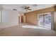 Bedroom featuring sliding door access to outdoor space and neutral carpet at 85 Alerion St, Las Vegas, NV 89138