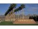 Entrance to the Summerlin community featuring a sign and palm trees with mountains in the background at 85 Alerion St, Las Vegas, NV 89138