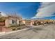 A view of a single-story home, complimented by neat landscaping and desert accents at 85 Alerion St, Las Vegas, NV 89138