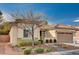 Charming single-story home with a well-maintained front yard and desert landscaping at 85 Alerion St, Las Vegas, NV 89138