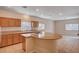 Modern kitchen with an island cooktop, great counter space, and ample natural light at 85 Alerion St, Las Vegas, NV 89138