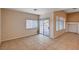 Cozy living space with a sliding glass door for outdoor access and natural light at 85 Alerion St, Las Vegas, NV 89138