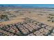 High angle view of the homes in the community surrounded by desert landscape at 8523 Peaceful Dreams St, Las Vegas, NV 89139