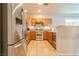 Modern kitchen with stainless steel refrigerator, ample counter space, and modern fixtures at 8523 Peaceful Dreams St, Las Vegas, NV 89139