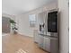 Light and airy dining area with hardwood floors and sliding glass doors at 9062 Lucky Crest St, Las Vegas, NV 89113