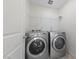 Laundry room with washer, dryer and shelving at 9062 Lucky Crest St, Las Vegas, NV 89113