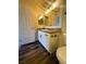 Bathroom features dark wood-style floors and granite countertops at , Henderson, NV 89014