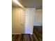 Interior white paneled door in a home with wood flooring at , Henderson, NV 89014