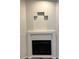 A close-up of the white modern fireplace in the living room at , Henderson, NV 89014