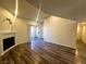 Open living area featuring wood floors, modern fireplace, and sliding glass door to the outside at , Henderson, NV 89014