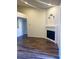 Living room featuring hardwood floors, recessed lighting, and a modern fireplace at , Henderson, NV 89014