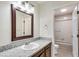 Bathroom featuring granite countertops, dark wood cabinets, and shower/tub combo at , Las Vegas, NV 89109