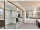 Bathroom boasting mirrored closet doors, a soaking tub and expansive cabinet space at , Las Vegas, NV 89109