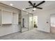 Bright bedroom featuring carpet, ceiling fan, mirrored closet doors, and plenty of space at , Las Vegas, NV 89109