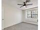 Bedroom featuring a large window seat, ceiling fan, fresh paint and modern carpeting at , Las Vegas, NV 89109