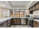 Kitchen area with stainless appliances, granite counters, and a garden window at , Las Vegas, NV 89109