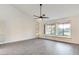 Living room boasting vaulted ceilings, wood flooring, ceiling fan, and large windows at , Las Vegas, NV 89109