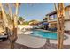 Backyard pool and patio area with ample seating, landscaping, and an inviting, relaxing atmosphere at , Las Vegas, NV 89109