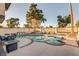 Inviting backyard pool and patio area with ample seating, landscaping, and views of the city at , Las Vegas, NV 89109