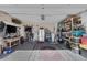 Organized garage with storage shelving and exercise equipment at 10212 Cider Mill Rd, Las Vegas, NV 89135