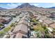 Aerial view of backyard oasis featuring pool, patio, seating and outdoor kitchen at 1163 Highbury Grove St, Henderson, NV 89002