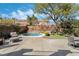 Relaxing backyard with pool, patio area, and comfortable seating for outdoor enjoyment at 1163 Highbury Grove St, Henderson, NV 89002