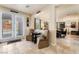 A stylish foyer featuring neutral tones, tiled flooring, and French doors opening to the outdoor area at 1163 Highbury Grove St, Henderson, NV 89002