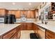 Well-equipped kitchen with granite countertops, ample cabinet space, and modern stainless steel appliances at 1163 Highbury Grove St, Henderson, NV 89002