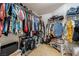 Organized walk-in closet with ample hanging space and shelving at 1163 Highbury Grove St, Henderson, NV 89002