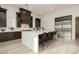 Bright, modern kitchen with stainless steel appliances and large center island at 11895 Skyline Arch Ct, Las Vegas, NV 89138