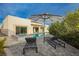 Resort-style pool and spa with modern lounge chairs for outdoor relaxation at 11895 Skyline Arch Ct, Las Vegas, NV 89138