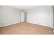 Empty carpeted room with neutral walls and a closet at 1220 Earth Ct, North Las Vegas, NV 89032