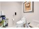 Clean bathroom showcasing a modern toilet, toiletries, and simple, elegant decor at 135 E Harmon Ave # 2601&2603, Las Vegas, NV 89109