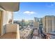 Stunning city view featuring high rise buildings, parking, and distant mountains on a bright sunny day at 135 E Harmon Ave # 2601&2603, Las Vegas, NV 89109