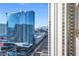 Hilton Grand Vacation buildings show clear blue sky and clean, eye-catching architecture at 135 E Harmon Ave # 2601&2603, Las Vegas, NV 89109