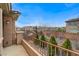 A balcony with desert landscaping features mature green trees and neighborhood views at 1381 Robard St, Las Vegas, NV 89135