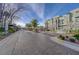 View of a gated residential community entrance with modern architecture and well-maintained landscaping at 1381 Robard St, Las Vegas, NV 89135