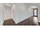 Entryway of a house featuring a hardwood floor, white trim, and neutral walls for a clean look at 1381 Robard St, Las Vegas, NV 89135