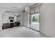 Bright living area with dark wood floors, fireplace, and backyard access through sliding glass doors at 1381 Robard St, Las Vegas, NV 89135