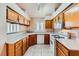 Functional kitchen with ample counter space and white appliances at 1424 Desert Hills Dr, Las Vegas, NV 89117