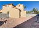 The backyard features an open space, surrounded by a block perimeter wall and some brick detail at 1444 Country Hollow Dr, Las Vegas, NV 89117