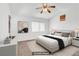 Relaxing main bedroom featuring carpet, natural light, ceiling fan and neutral decor at 1444 Country Hollow Dr, Las Vegas, NV 89117