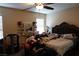 Main bedroom featuring a ceiling fan and a large bed at 180 Plumpjack Ave, Henderson, NV 89002