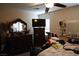 Primary bedroom featuring ceiling fan and a large dresser at 180 Plumpjack Ave, Henderson, NV 89002