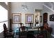 Dining room with chandelier lighting and stairway to the right at 180 Plumpjack Ave, Henderson, NV 89002