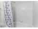 Functional bathroom with a shower and patterned shower curtain at 1800 Edmond St # 108, Las Vegas, NV 89146