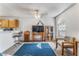 Open-concept living room with neutral colors, ceiling fan and seamless transition into the kitchen at 1800 Edmond St # 108, Las Vegas, NV 89146