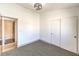 This bedroom features neutral carpet, access to the ensuite bathroom, and closet at 2133 Linden Tree St, Las Vegas, NV 89156